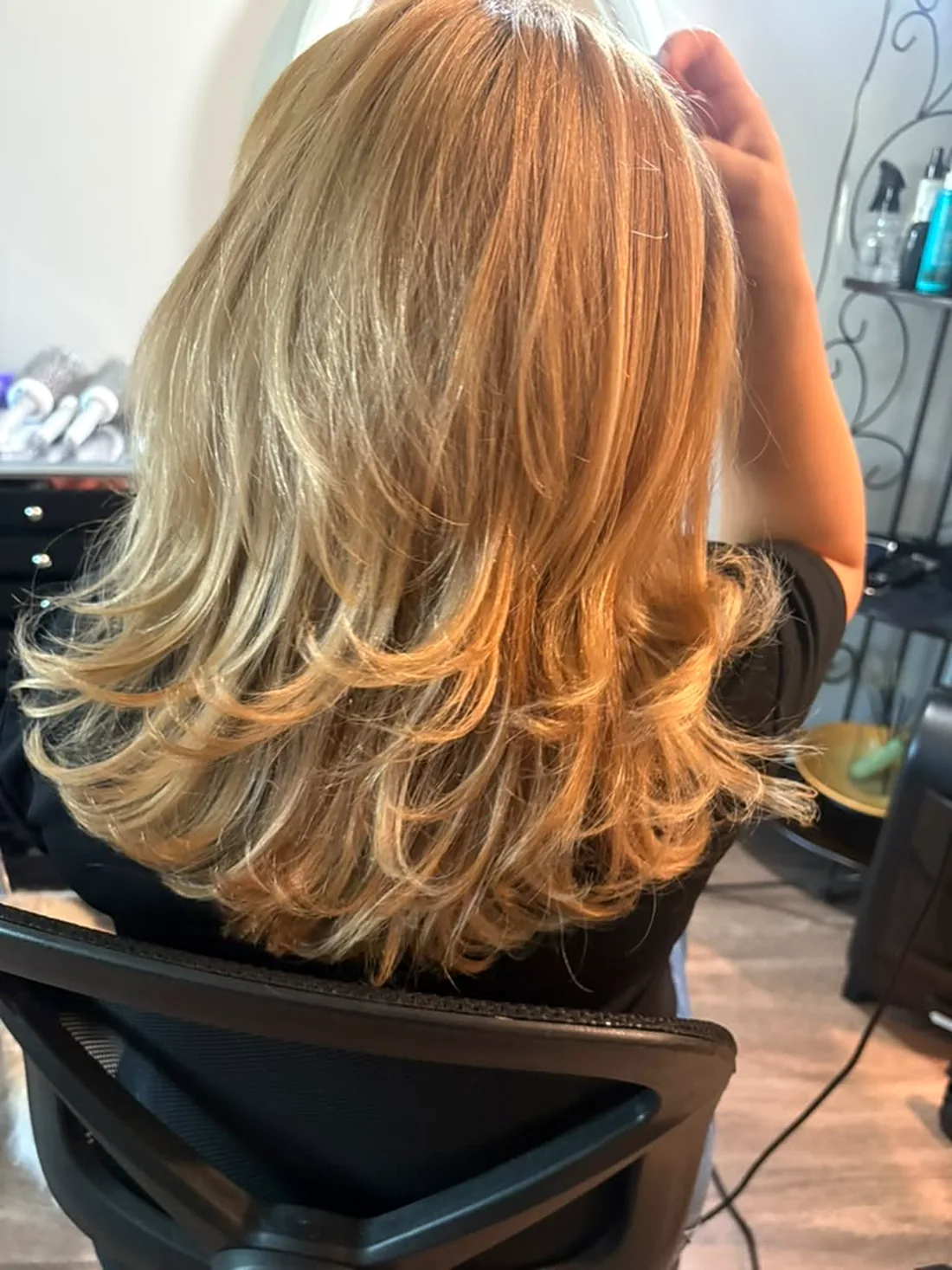 Blonde balayage with soft curls
